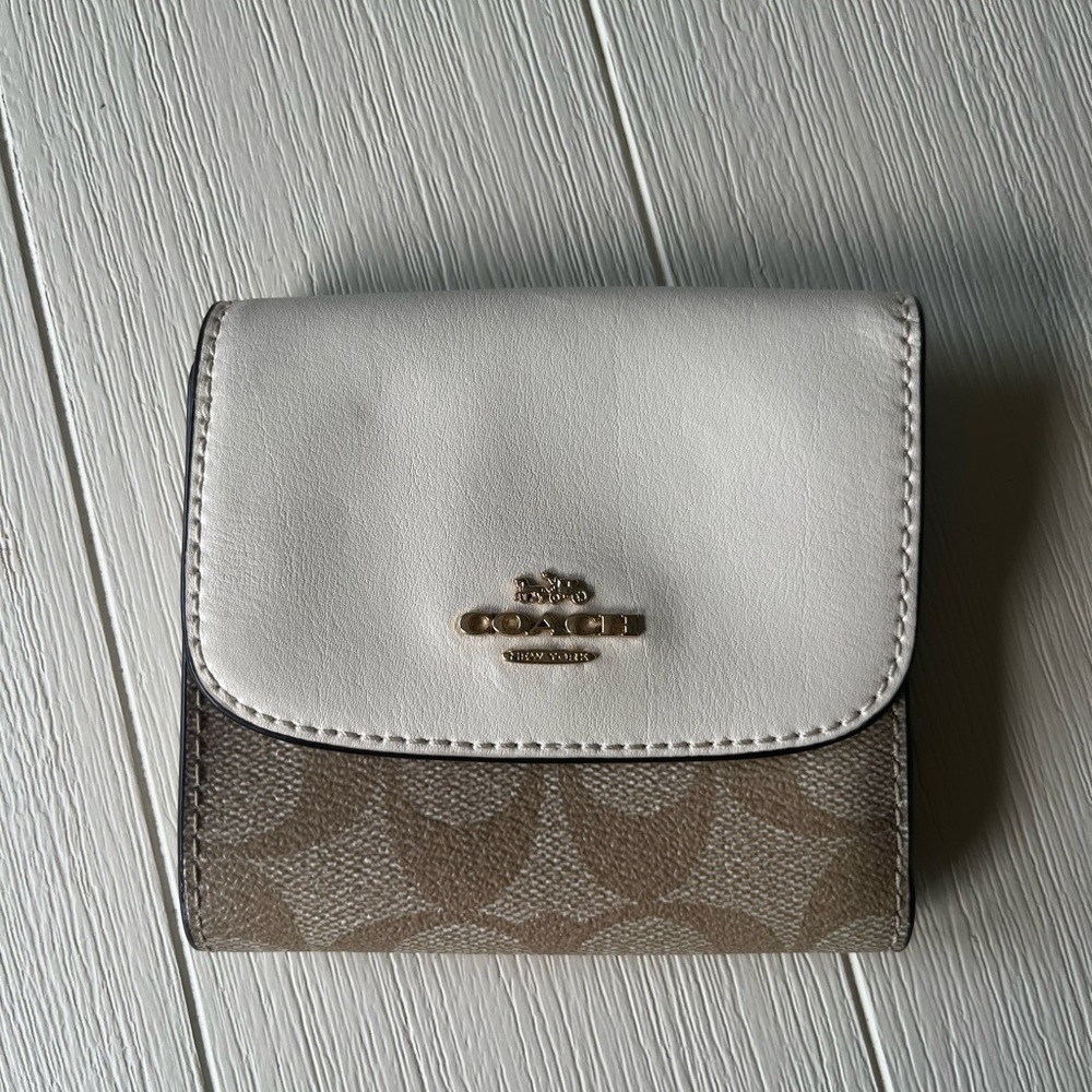 Coach trifold wallet leather/signature canvas
